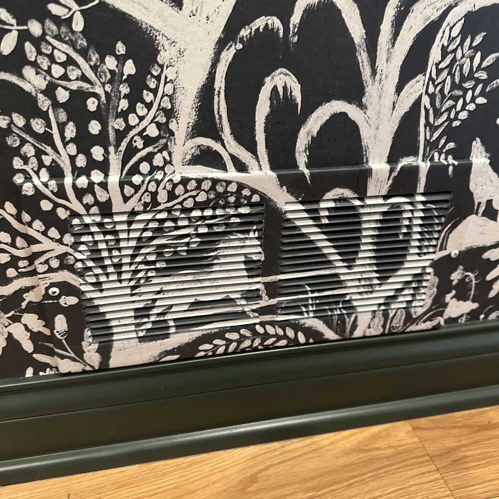 Expert wallpaper installation showcasing precision craftsmanship